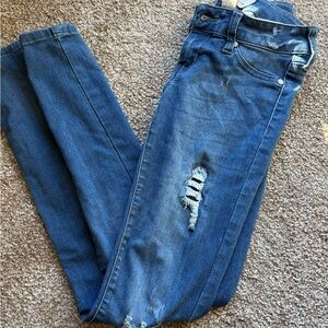 Altar’s State distressed skinny jeans. 0 / 24